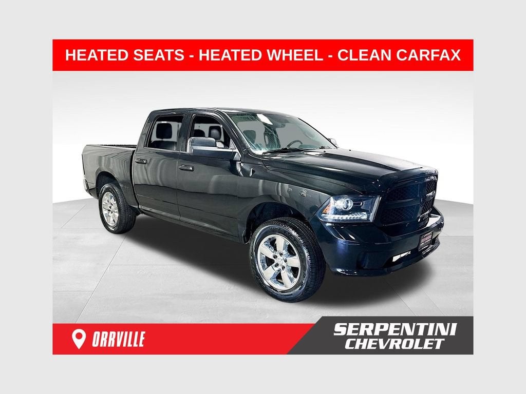 2016 RAM 1500 Sport in Black — front three-quarter view